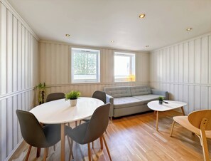 House, 2 Bedrooms, Accessible, Balcony | Living room | Books - Ledaal Place 1 by Stavanger BnB (Stavanger)