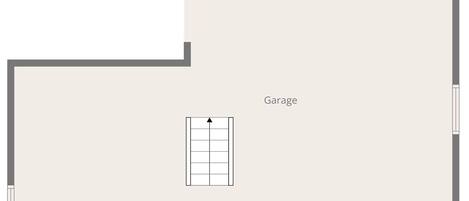 A floor plan with a garage and a small enclosed area, possibly a utility room.