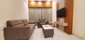 Living area - KRISHNA SAI SUITES (Rahata)