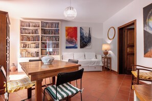 Apartment, Garden View | Living area | 32-inch flat-screen TV with cable channels - Il Ferrone Apartment With Garden (Greve in Chianti)