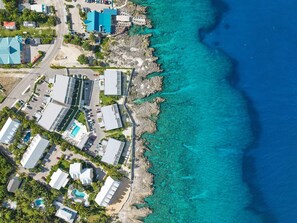 Exterior - 40 Sunset Point Vacations, Luxury Oceanfront Condo (West Bay)