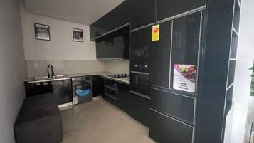 Apartment, Balcony, City View | Private kitchen | Full-size fridge, microwave, oven, cookware/dishes/utensils