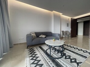 Apartament, balcó, vistes a la ciutat | Sala d'estar