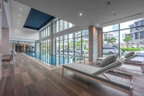 Indoor pool - Free housekeeping visits during your stay - StayShort - Canal View 2BR in the Heart of Business Bay - Sleeps 6! (Business Bay)