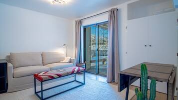 Condo, Multiple Beds, Patio, Mountain View (Indian Springs Oasis) | Living area | 42-inch flat-screen TV with digital channels