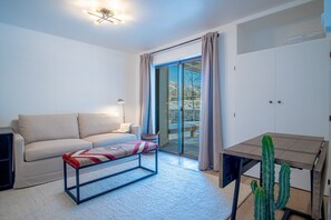 Condo, Multiple Beds, Patio, Mountain View (Indian Springs Oasis) | Living area | 42-inch flat-screen TV with digital channels