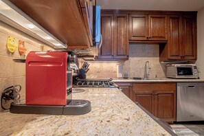 Condo, Multiple Beds, Patio, Mountain View (International Village at Warm Springs) | Private kitchen | Dining tables