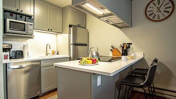 Condo, Multiple Beds, Patio, Mountain View (Bonne Vie 2233) | Private kitchen | Dining tables