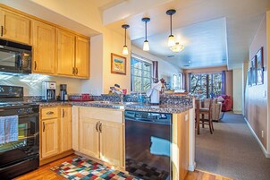 Condo, 2 Queen Beds, Patio, Mountain View (Stay at Sweetwater) | Private kitchen | Dining tables