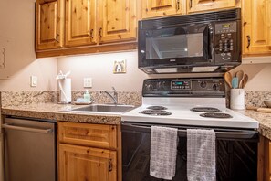 Condo, 2 Queen Beds, Patio, Mountain View (Wildwood Cottage at Villager) | Private kitchen | Dining tables