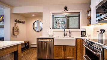 Condo, Multiple Beds, Patio, Mountain View (Bluff Condo 4138) | Private kitchen | Dining tables