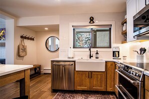 Condo, Multiple Beds, Patio, Mountain View (Bluff Condo 4138) | Private kitchen | Dining tables