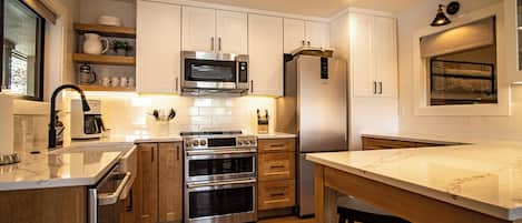 Condo, Multiple Beds, Patio, Mountain View (Bluff Condo 4138) | Private kitchen | Dining tables