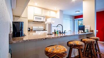 Condo, Multiple Beds, Patio, Mountain View (Sun Valley Condo 115) | Private kitchen | Dining tables