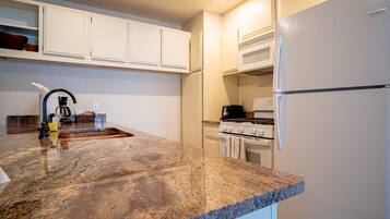 Condo, Multiple Beds, Patio, Mountain View (Sun Valley Condo 115) | Private kitchen | Dining tables