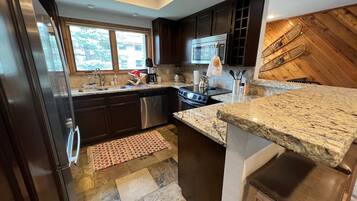 Condo, Multiple Beds, Patio, Mountain View (Ridge Condo 2601) | Private kitchen | Dining tables