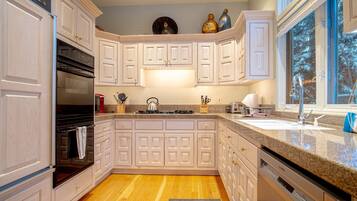 House, Multiple Beds, Patio, Mountain View (Trail Creek Treasure) | Private kitchen | Dining tables