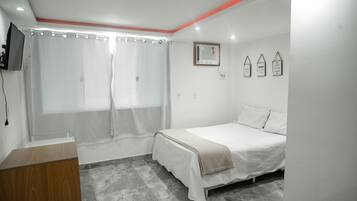 Iron/ironing board, travel crib, free WiFi, bed sheets