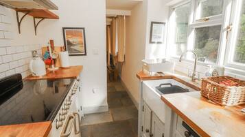 Fridge, microwave, toaster, cookware/dishes/utensils