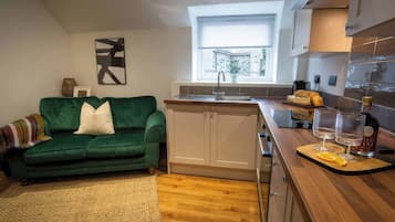 Fridge, microwave, toaster, cookware/dishes/utensils