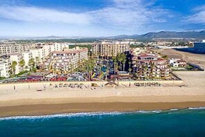 On the beach, sun-loungers, beach towels