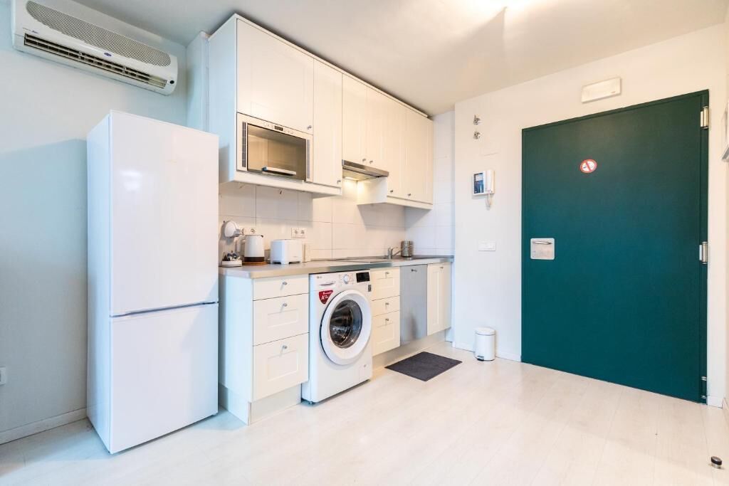 Apartamento standard | Cozinha privada | Geladeira, micro-ondas, cooktop, chaleira elétrica