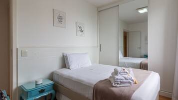 Iron/ironing board, travel crib, free WiFi, bed sheets