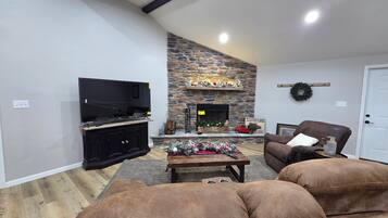 Smart TV, fireplace, foosball