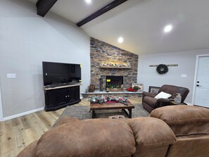 Smart TV, fireplace, foosball