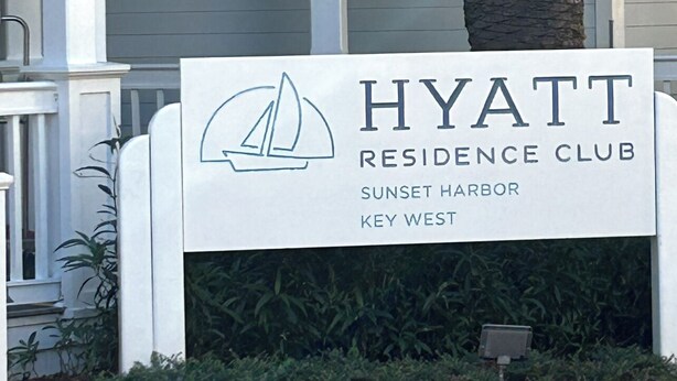 A sign for the Hyatt Residence Club at Sunset Harbor, Key West, featuring a sailboat logo. - Sunset Harbor studio unit, large bath , Truman White House, Mallory Square, etc (Key West)