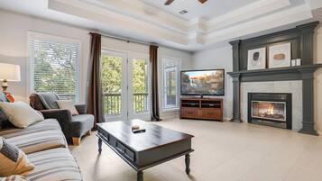 Smart TV, chimenea, reproductor de DVD y tenis de mesa