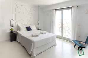 Habitación doble | Minibar, caja fuerte, wifi gratis y ropa de cama
