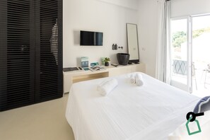 Habitación doble | Minibar, caja fuerte, wifi gratis y ropa de cama
