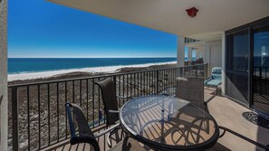 Outdoor dining - Phoenix 6 6713 Gulf-front condo (Orange Beach)