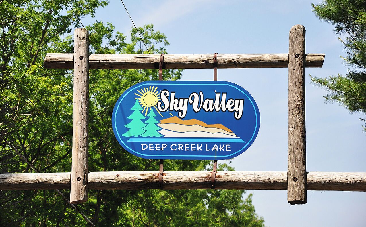 A sign for Sky Valley Deep Creek Lake.