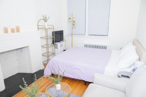 1 غرفة نوم ومكواة/لوح كي وخدمة الإنترنت وملاءات أسرّة