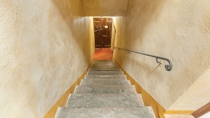 A staircase with a handrail leading to a door at the top. - Borghetto di San Filippo Flat with Pool (Barberino Tavarnelle)