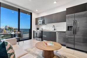 Fridge, microwave, oven, stovetop - Sleek Studio | Bay Views + Beach Club Access (Miami)