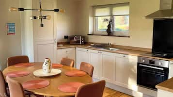 Fridge, microwave, toaster, cookware/dishes/utensils
