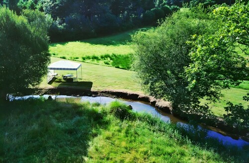 Chambre d’hôtes « A L’abri - An Douar La Terre » avec terrasse, jardin partagés et Wi-Fi