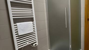Shower, free toiletries, hair dryer, towels