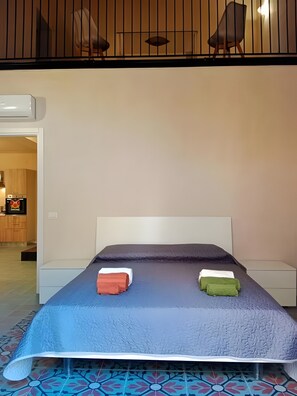 2 slaapkamers, een strijkplank/strijkijzer, beddengoed