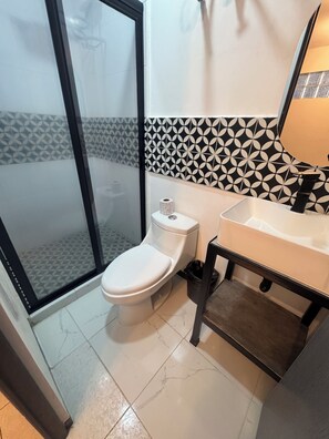 Economy Double Room, 1 Double Bed, No Windows | Bathroom | Shower, free toiletries, towels, soap