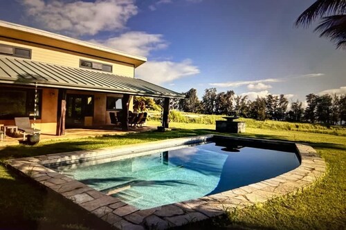 Oceanfront gated estate w/heated saltwater pool.