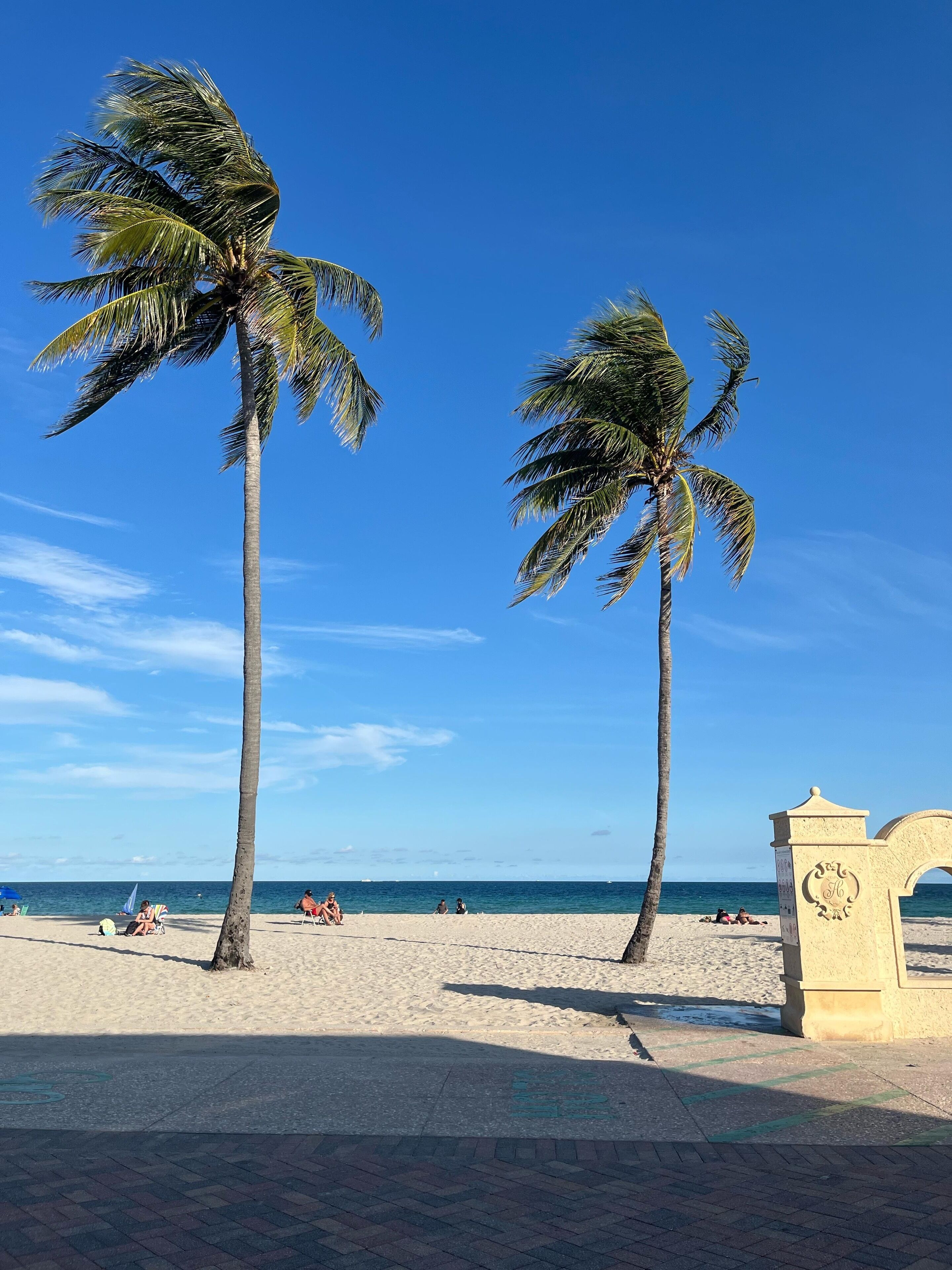 On the beach, sun loungers, beach towels