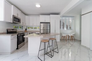 Fridge, microwave, oven, stovetop - Casa Angelica Apt 203 steps to Sandy Beach (Rincon)