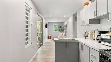 Fridge, microwave, stovetop, coffee/tea maker