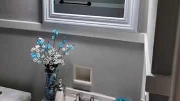 Hair dryer, towels, soap, toilet paper