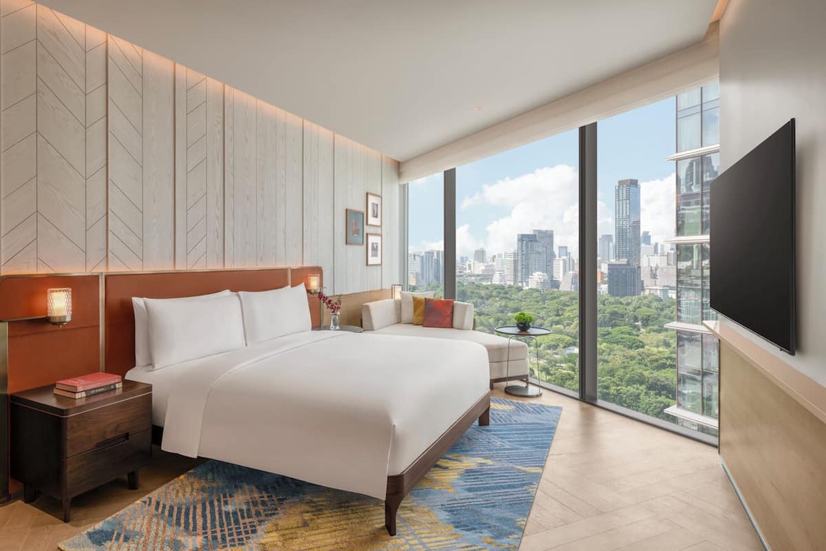 Quarto, 1 cama King, vista para o parque (Boulevard) | Frigobar (abastecido com alguns itens grátis), cofres nos quartos