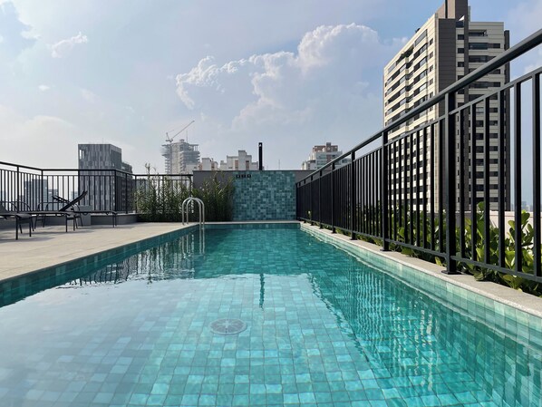 Outdoor pool, pool umbrellas, pool loungers